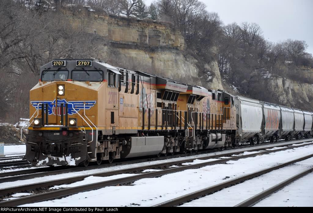 Grain train rolls west through Division